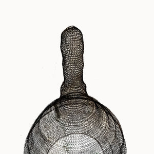 Handcrafted wire mesh sculpture with elongated neck on plain background