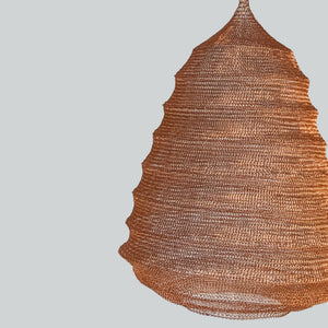 Handwoven rattan pendant light with natural brown texture, boho home decor accent