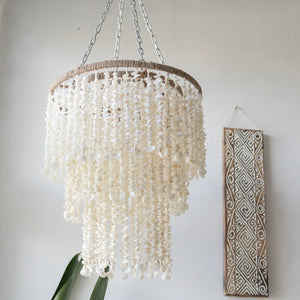 Handmade seashell ceiling chandelier with layered shell strands, coastal boho home decor