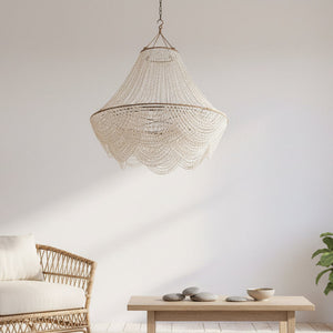Seashell Chandelier infrot of the white wall