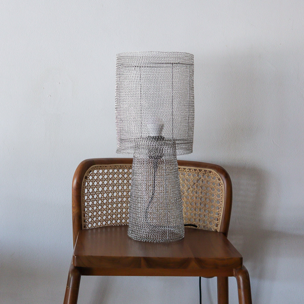 Decorative Wire Mesh Table Lamp with a textured shade on a wooden chair