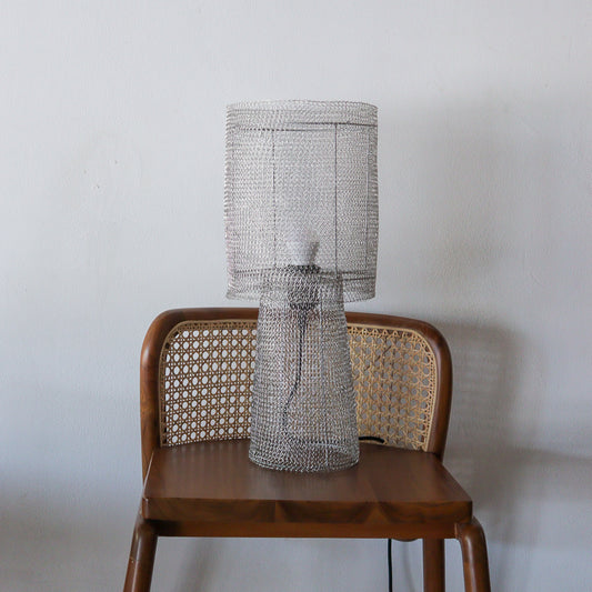 Decorative Wire Mesh Table Lamp with a textured shade on a wooden chair