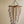 Handmade wooden bead chandelier with cream tassels and rustic sticks, eco-friendly decor