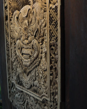 intricately hand-carved Balinese wooden wall panel with traditional ornate detailing
