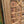 Hand-carved wooden door with intricate geometric and floral patterns, rustic finish