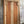 Hand-carved Balinese wood door with intricate ethnic patterns and ornate frame detail