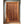Hand-carved Balinese wooden door with intricate frame and metal accents, luxury home decor