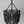 Boho black wooden bead chandelier with handcrafted Balinese design on white background