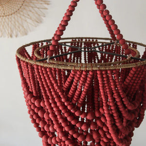 Handmade red beaded pendant chandelier with natural woven accents, Balinese decor style