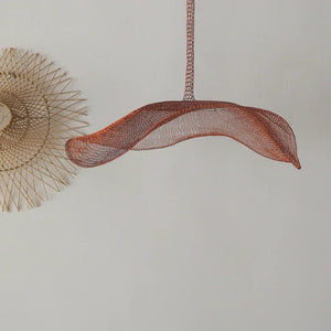 Handmade woven pendant light with wavy copper mesh shade, minimalist wall decor