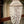 Handmade seashell ceiling pendant lamp with natural woven shell strands, coastal decor