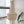 Handmade Balinese seashell chandelier with elegant beaded design in a bright modern room
