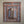 Hand-carved wooden wall mirror frame with intricate Balinese floral patterns
