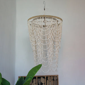 Handmade seashell chandelier with white beads, boho coastal home decor, hanging indoors