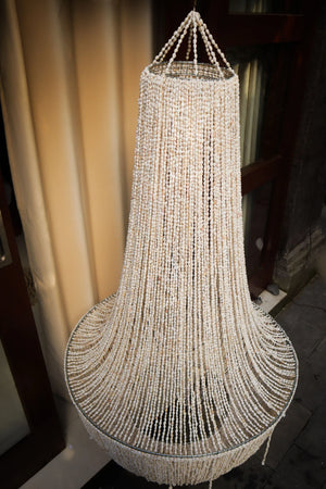 Handmade Balinese seashell chandelier with cascading beads for luxury home decor