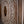 Hand-carved Balinese wood panel with intricate floral and circular patterns