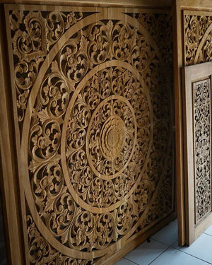 Hand-carved Balinese wooden panel with intricate floral mandala design, luxury home decor