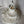 Handmade seashell chandelier with intricate woven pattern, coastal boho home decor