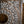 Hand-carved Balinese wood wall panel with intricate floral patterns and circular design