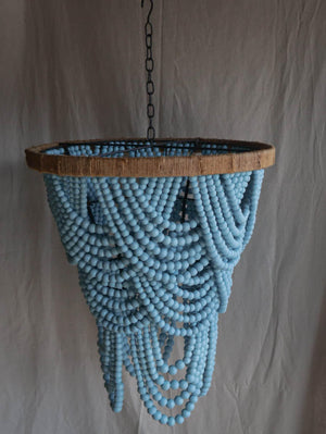 Handmade blue beaded chandelier with jute-wrapped frame, hanging on a chain