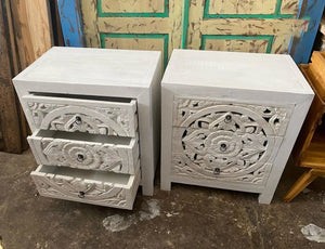 Hand-carved white wooden nightstands with intricate floral patterns, Balinese furniture.