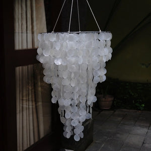 Handmade white seashell chandelier with cascading capiz shells, outdoor patio decor