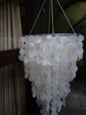 Handmade white capiz shell chandelier with round discs, hanging decor for eco-friendly homes