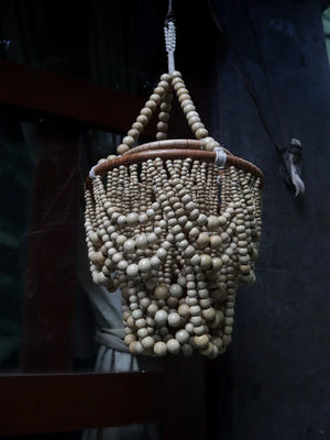 Handmade Balinese beaded chandelier with natural wood beads, bohemian ceiling decor