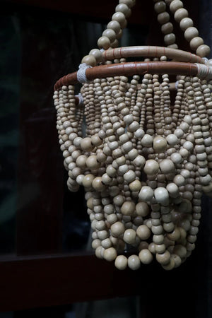 Handmade beaded chandelier with natural wood beads for bohemian home decor